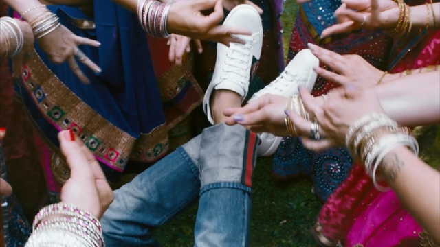 Video Reference: ceremony, ritual, hand, tradition, event, finger, fun, arm, mehndi, temple, Person