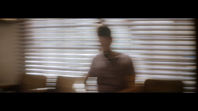 Video Reference: photograph, man, sitting, light, standing, snapshot, shoulder, muscle, human body, darkness, Person