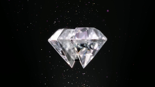 Video Reference: Diamond, Gemstone, Crystal, Space, Fashion accessory, Jewellery, Quartz, Macro photography, Mineral, Photography, Person