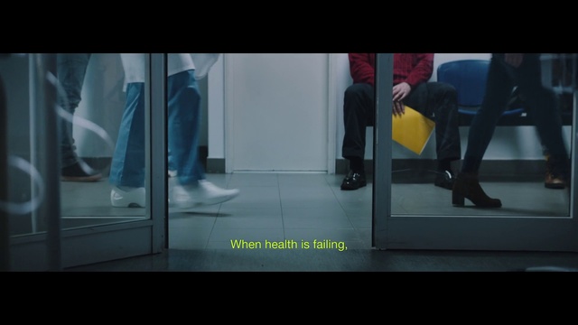 Video Reference: Snapshot, Advertising, Screenshot, Font, Photography, Glass, Fictional character, Architecture, Digital compositing, Floor