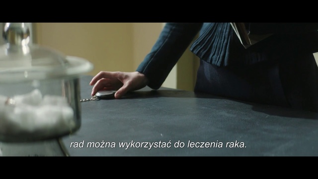 Video Reference: Hand, Finger, Floor, Flooring, Photography, Photo caption, Indoor, Person, Woman, Table, Pot, Food, Cake, Front, Sitting, Man, Girl, Using, Young, Black, Holding, Standing, Blue, White, Remote, Room, Teeth, Screenshot, Feet, Text, Kitchenware, Porcelain