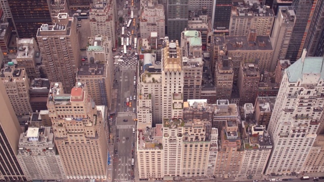 Video Reference: metropolitan area, urban area, city, skyscraper, metropolis, cityscape, skyline, building, downtown, aerial photography, Person