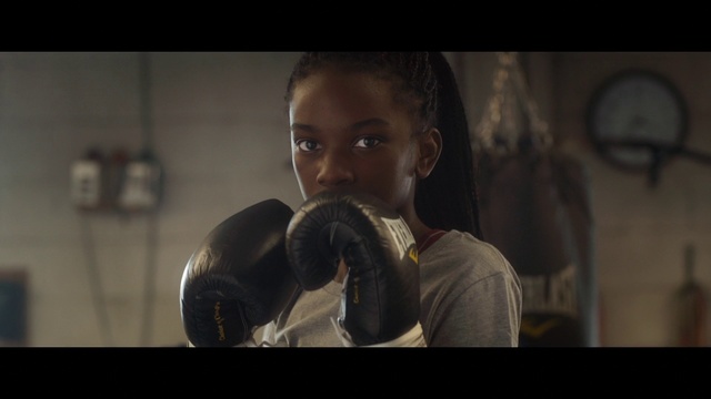 Video Reference: Arm, Screenshot, Muscle, Boxing glove, Photography, Fictional character, Scene