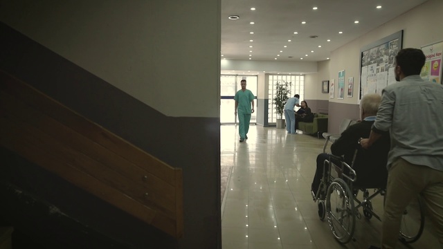 Video Reference: Floor, Room, Ceiling, Building, Flooring, Wheelchair, Tourist attraction