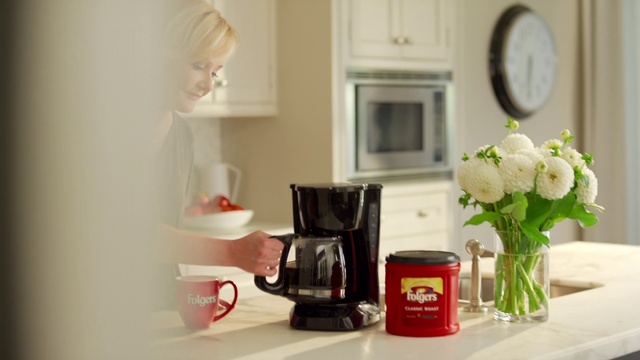 Video Reference: Red, Room, Small appliance, Interior design, Material property, Home, Furniture, Coffeemaker, Plant, Shelf