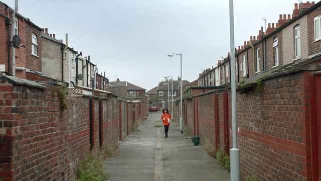 Video Reference: Town, Neighbourhood, Street, Residential area, Wall, Road, Lane, Building, Alley, Infrastructure