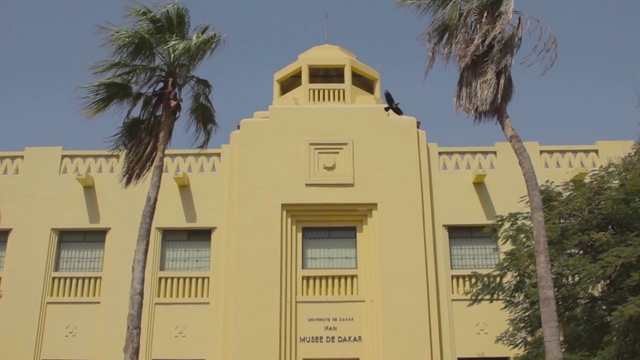 Video Reference: Property, Building, Architecture, Yellow, House, Tree, Facade, Dome, Real estate, Palm tree