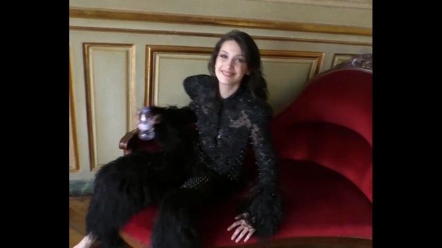 Video Reference: Fur, Fur clothing, Hair, Lady, Facial expression, Clothing, Long hair, Fun, Black hair, Smile, Person