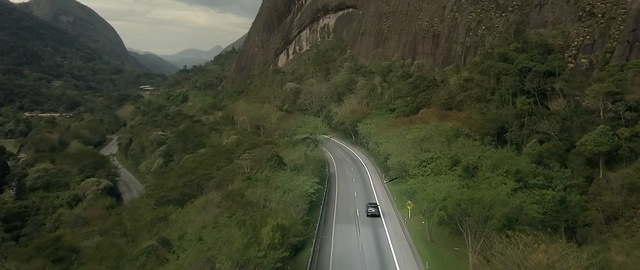 Video Reference: road, mountain pass, mountainous landforms, mode of transport, mountain, hill station, geological phenomenon, tree, highland, terrain