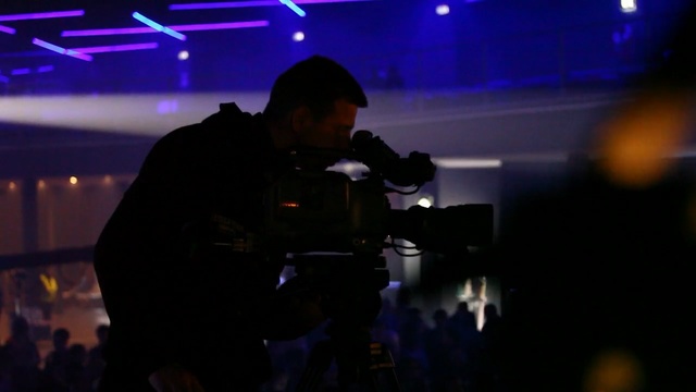 Video Reference: event, entertainment, night, darkness, stage, technology, performance, audience, fun, midnight