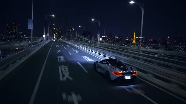 Video Reference: Highway, Road, Freeway, Lane, Vehicle, Mode of transport, Car, Performance car, Automotive lighting, Automotive design