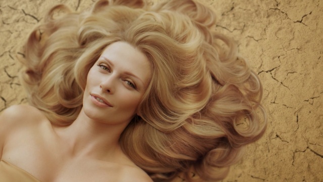 Video Reference: Hair, Blond, Hairstyle, Face, Hair coloring, Ringlet, Beauty, Chin, Long hair, Layered hair