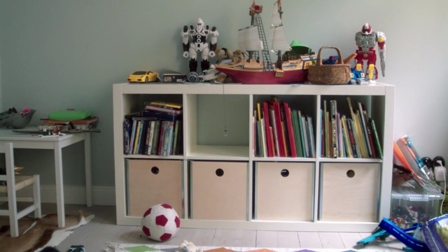 Video Reference: shelving, shelf, furniture, room, bookcase, desk, product, table, chest of drawers