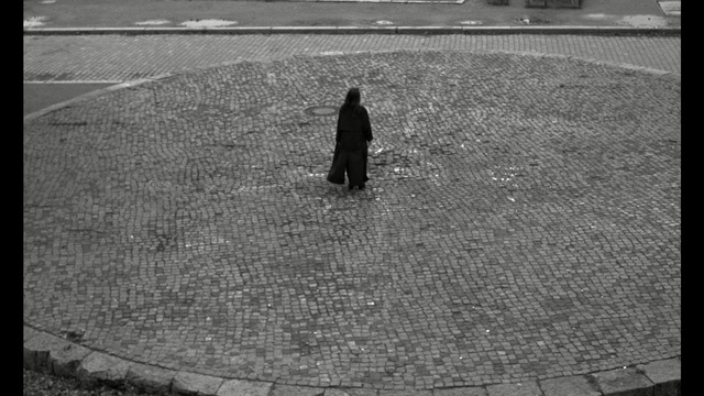 Video Reference: white, black, photograph, black and white, monochrome photography, shadow, infrastructure, photography, sky, asphalt, Person