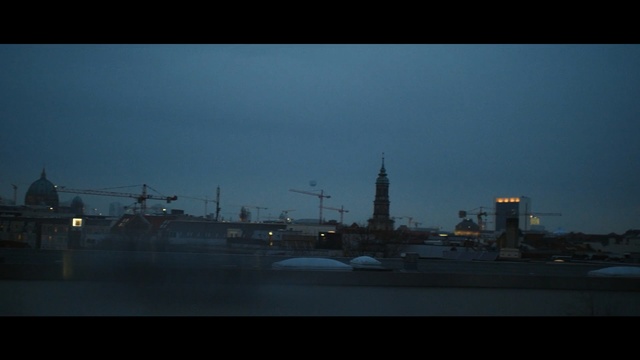 Video Reference: sky, skyline, urban area, waterway, cityscape, night, city, dusk, evening, dawn, Person