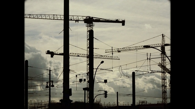Video Reference: overhead power line, sky, electricity, electrical supply, black and white, public utility, transmission tower, line, cloud, energy