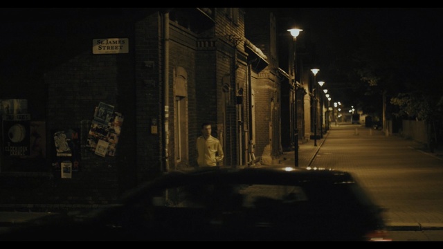 Video Reference: Night, Darkness, Street, Light, Town, Urban area, Infrastructure, Midnight, Alley, Road, Person