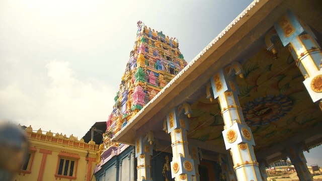 Video Reference: Hindu temple, Temple, Place of worship, Building, Architecture, Historic site, Temple, Wat, Sky, Facade