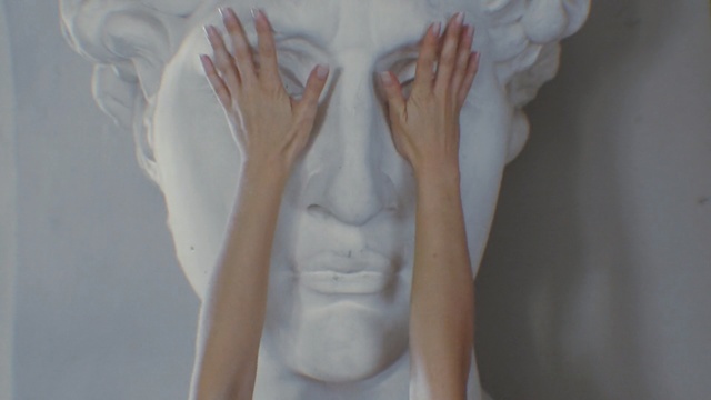 Video Reference: White, Hand, Skin, Arm, Joint, Sculpture, Finger, Human body, Art, Gesture, Person