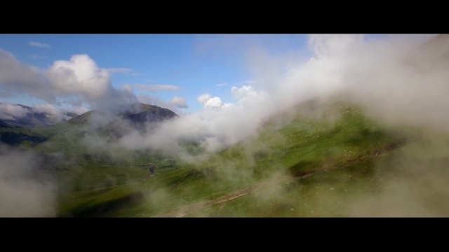 Video Reference: sky, mountainous landforms, cloud, nature, mountain, atmosphere, highland, wilderness, ecosystem, mountain range