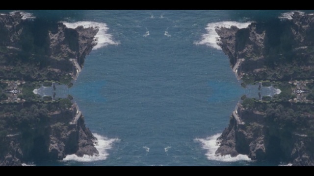 Video Reference: coastal and oceanic landforms, cliff, coast, promontory, sky, geological phenomenon, sea, terrain, ocean, aerial photography