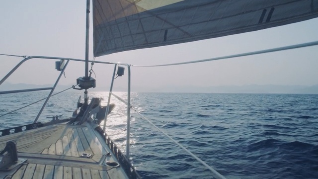 Video Reference: Sailing, Sail, Boat, Vehicle, Sailboat, Sea, Ocean, Water transportation, Yacht, Sky, Person