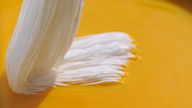 Video Reference: yellow, close up, macro photography, dairy product, commodity