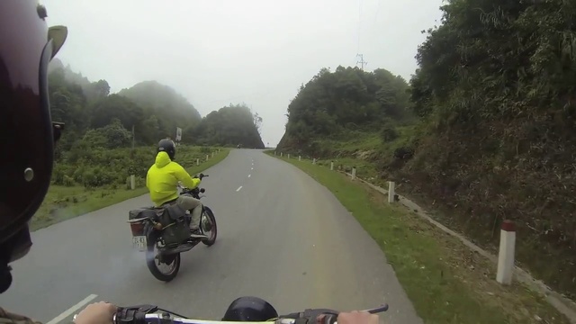 Video Reference: Road, Vehicle, Lane, Atmospheric phenomenon, Motorcycling, Mode of transport, Thoroughfare, Mountain pass, Asphalt, Recreation