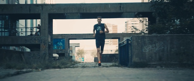 Video Reference: wall, infrastructure, urban area, building, road, sky, city, facade, recreation, street, Person