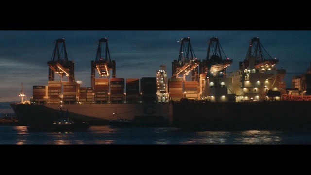 Video Reference: Vehicle, Sky, Night, Container ship, Watercraft, Ship, Harbor, Port, Boat, Industry, Person