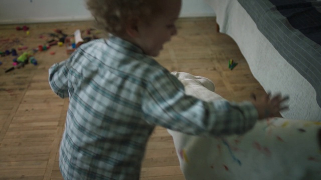 Video Reference: Floor, Child, Arm, Flooring, Toddler, Joint, Hardwood, Leg, Back, Play