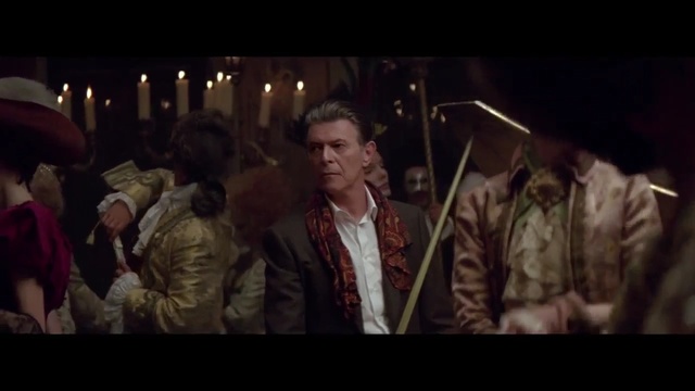Video Reference: screenshot, crowd, gentleman, darkness, midnight, scene, song, film, audience, Person