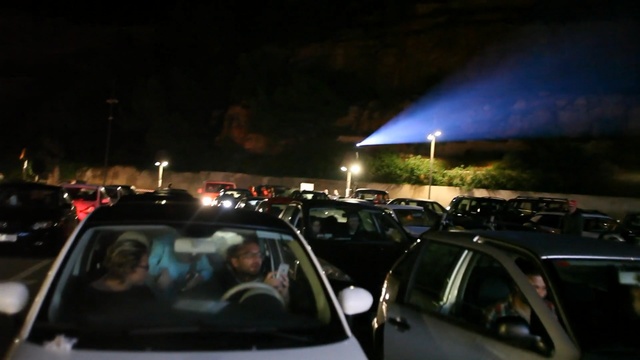 Video Reference: car, land vehicle, vehicle, motor vehicle, night, automotive design, luxury vehicle, traffic, darkness, city car