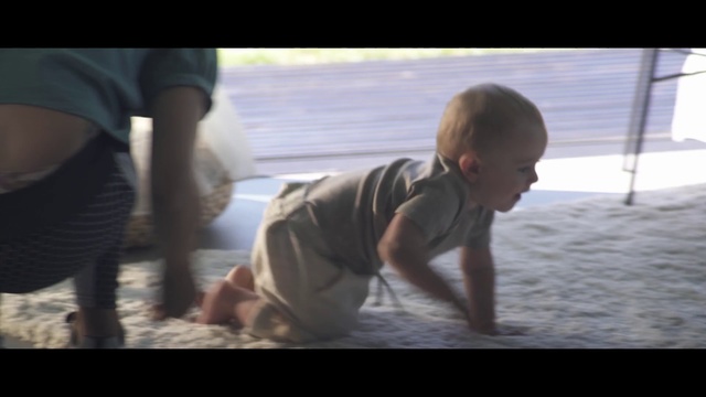 Video Reference: Human, Child, Photography, Personal protective equipment, Toddler, Vacation, Fictional character, Sand, Play