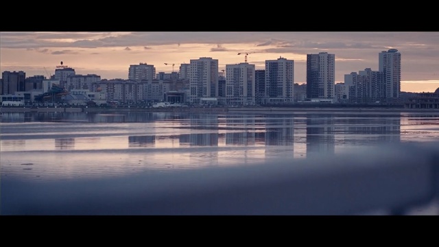 Video Reference: cityscape, reflection, skyline, water, city, sky, urban area, daytime, metropolis, skyscraper