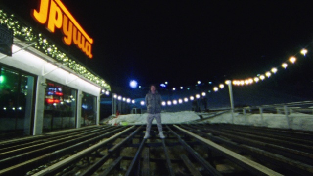 Video Reference: Transport, Night, Metropolitan area, Train station, Metropolis, Building, Architecture, Electricity, Street light, Track