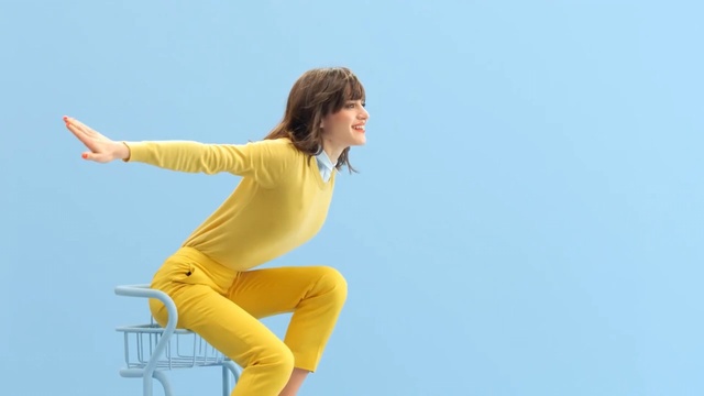Video Reference: yellow, standing, sitting, shoulder, joint, fun, arm, sky, girl, happiness