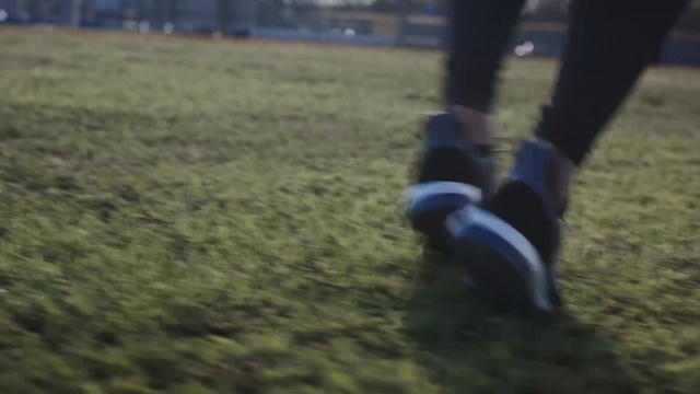 Video Reference: grass, plant, lawn, race, grass family, tree, player, recreation, shoe, fun