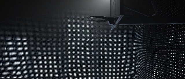 Video Reference: texture, pattern, textured, material, loudspeaker, backdrop, design, textile, fabric, wallpaper, surface, black, panel, rough, industry, industrial, Person