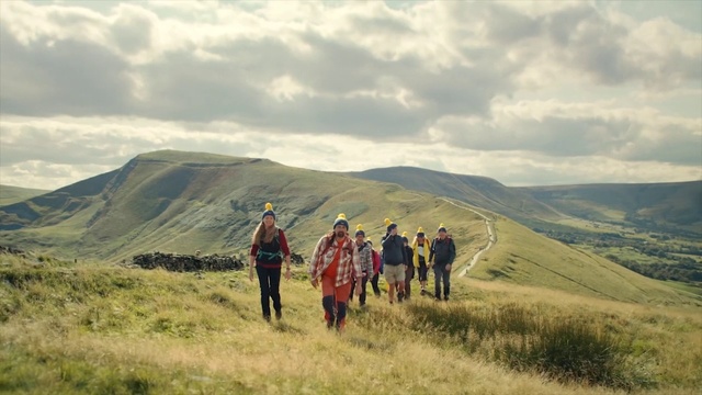 Video Reference: People in nature, Mountainous landforms, Grassland, Hill, Highland, Mountain, Fell, Wilderness, Adventure, Sky