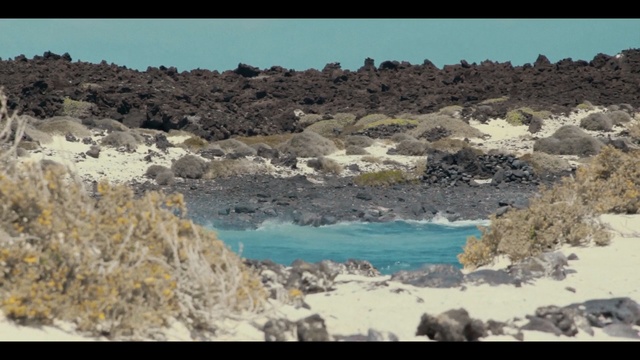 Video Reference: rock, sky, sea, coast, shore, geology, inlet, coastal and oceanic landforms, terrain, bay
