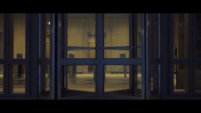 Video Reference: window, darkness, light, door, glass, screenshot, wood, midnight, computer wallpaper, sky, Person