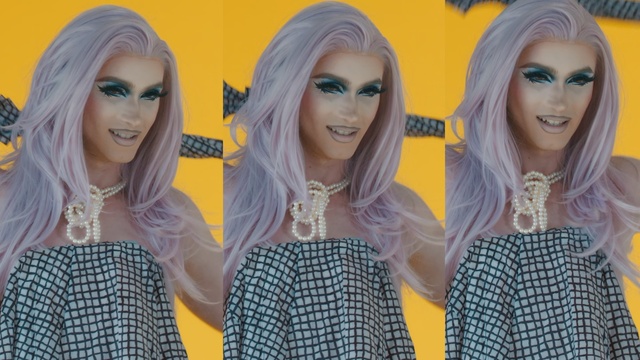 Video Reference: Hair, Face, Blond, Yellow, Eyebrow, Hairstyle, Beauty, Lip, Fashion, Hair coloring, Person, Woman, Posing, Standing, Photo, Sitting, Table, Group, Couple, Wearing, People, Side, Man, Holding, White, Young, Human face, Fashion accessory, Smile, Doll, Dress, Clothing, Long hair, Girl