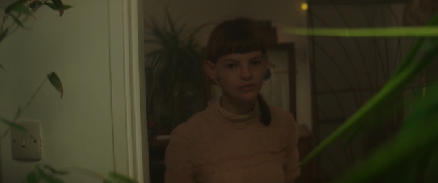 Video Reference: green, face, mammal, vertebrate, snapshot, eye, girl, human, human body, darkness