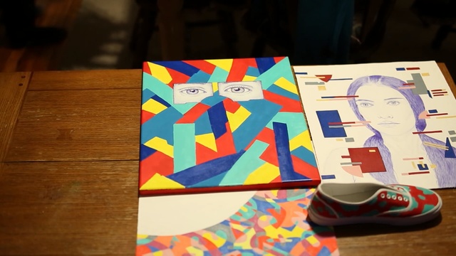 Video Reference: blue, design, art, material, pattern, font, Person