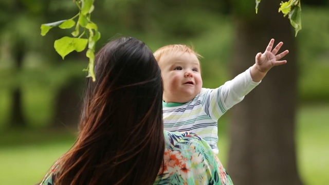 Video Reference: green, nature, child, tree, girl, leaf, grass, emotion, fun, plant, Person