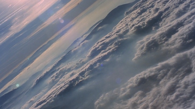 Video Reference: sky, cloud, atmosphere, daytime, geological phenomenon, meteorological phenomenon, cumulus, sunlight, aerial photography, earth