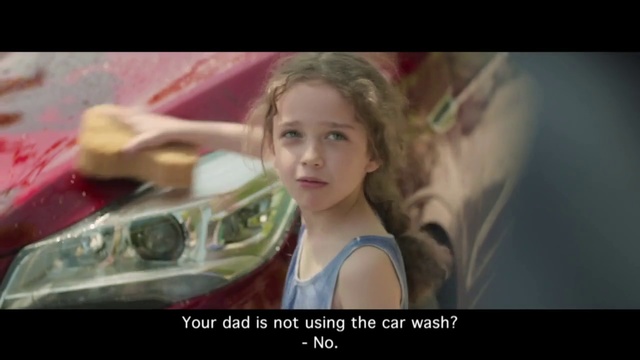 Video Reference: Hair, Facial expression, Blond, Beauty, Smile, Vehicle door, Snapshot, Photography, Automotive design, Brown hair