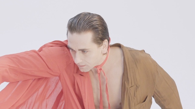 Video Reference: Hair, Hairstyle, Forehead, Neck, Skin, Shoulder, Pink, Outerwear, Human, Jacket, Person