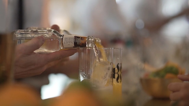 Video Reference: Water, Alcohol, Hand, Glass, Drink, Finger, Drinkware, Transparent material, Glass bottle, Tableware